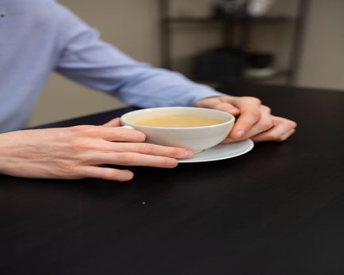 A short relaxing coffee break during a busy regular workday